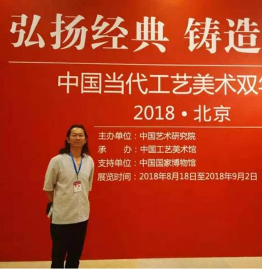 周文龙（高级工艺美术师；河南省工艺美术大师）